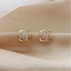 Sybil | Gold Spiral Earrings with Crystals